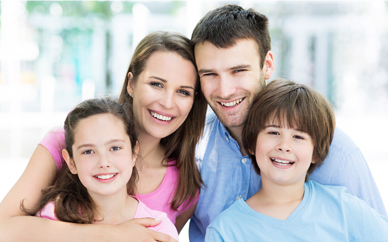 Family dentist in Beamsville at Beamstown Dental Group demonstrating proper brushing technique
